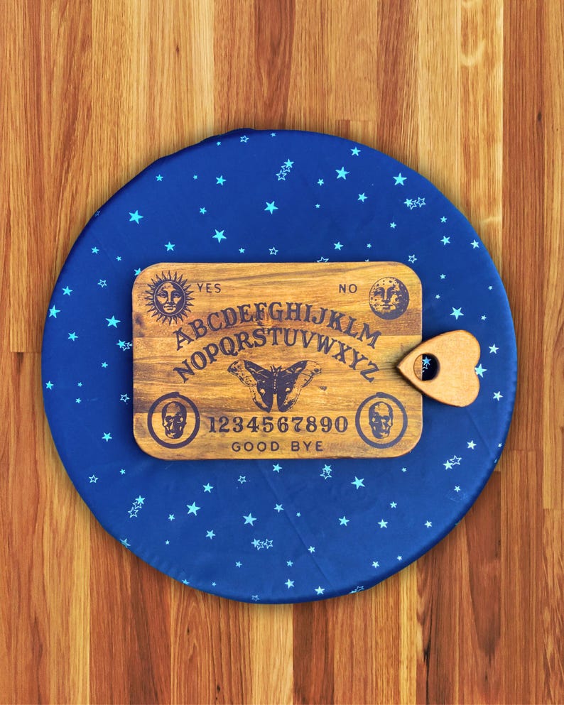 Atlas Moth spirit board on star mat