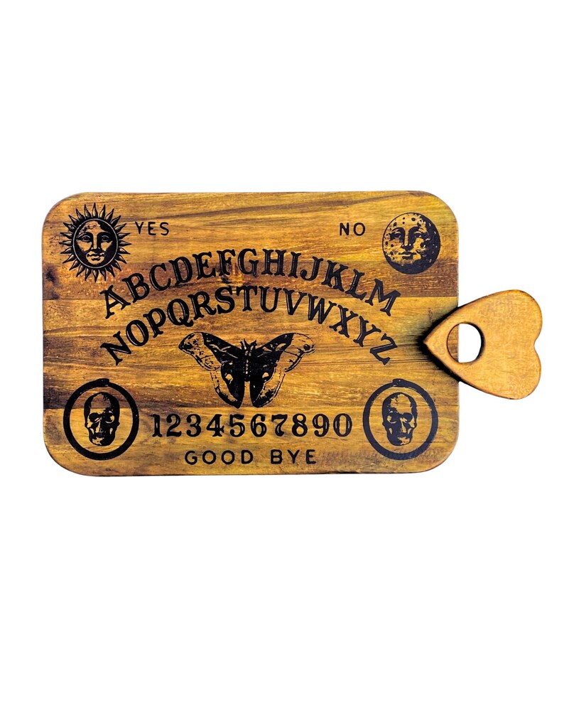 Atlas Moth spirit board detail with planchette